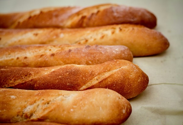 Baguette topped with fried shrimp