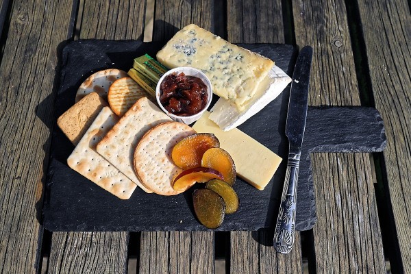 Cheese and pickle on crackers